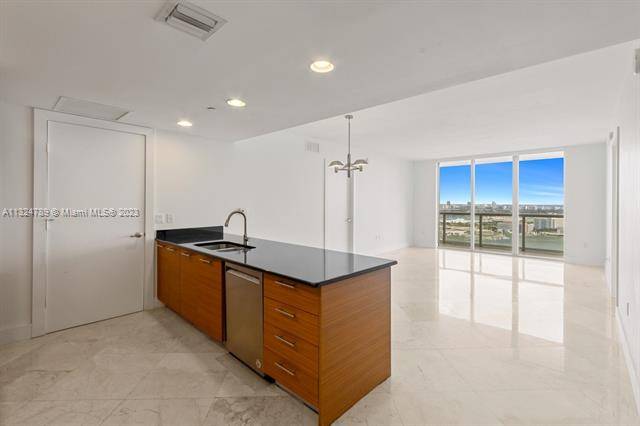 Terrific Direct Bay Views from this 2bd +Den!